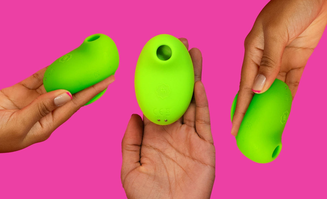 Sugador de clitóris PIX da Pantynova em mãos, disponível em verde vibrante.